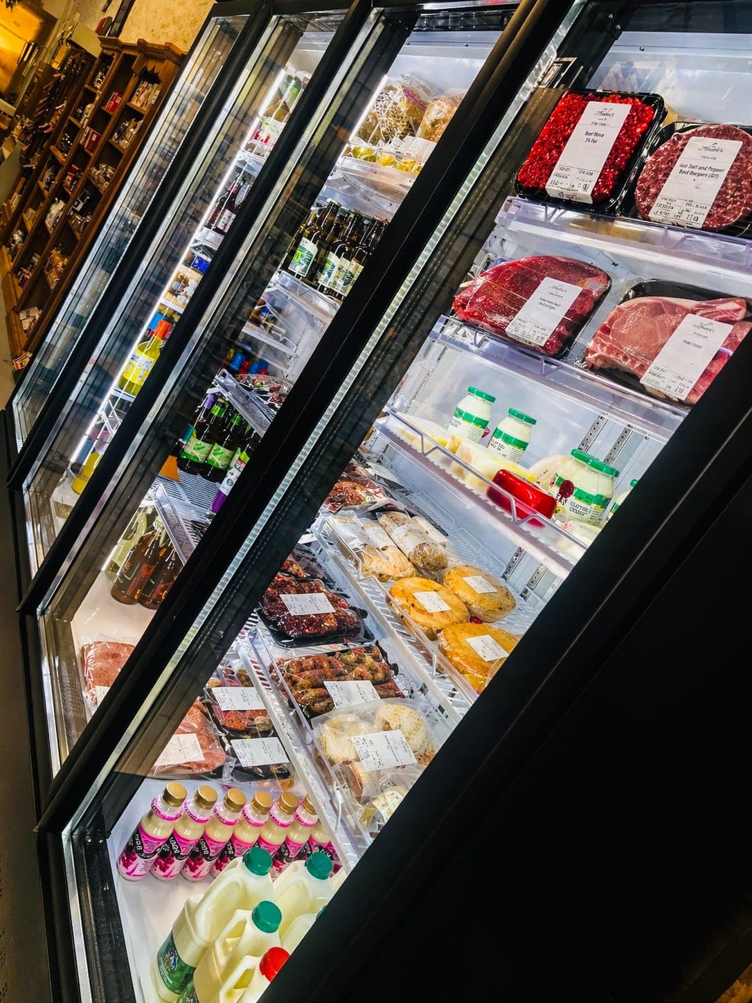 The farm shop chillers stocked with local meats, dairy, wines and beers