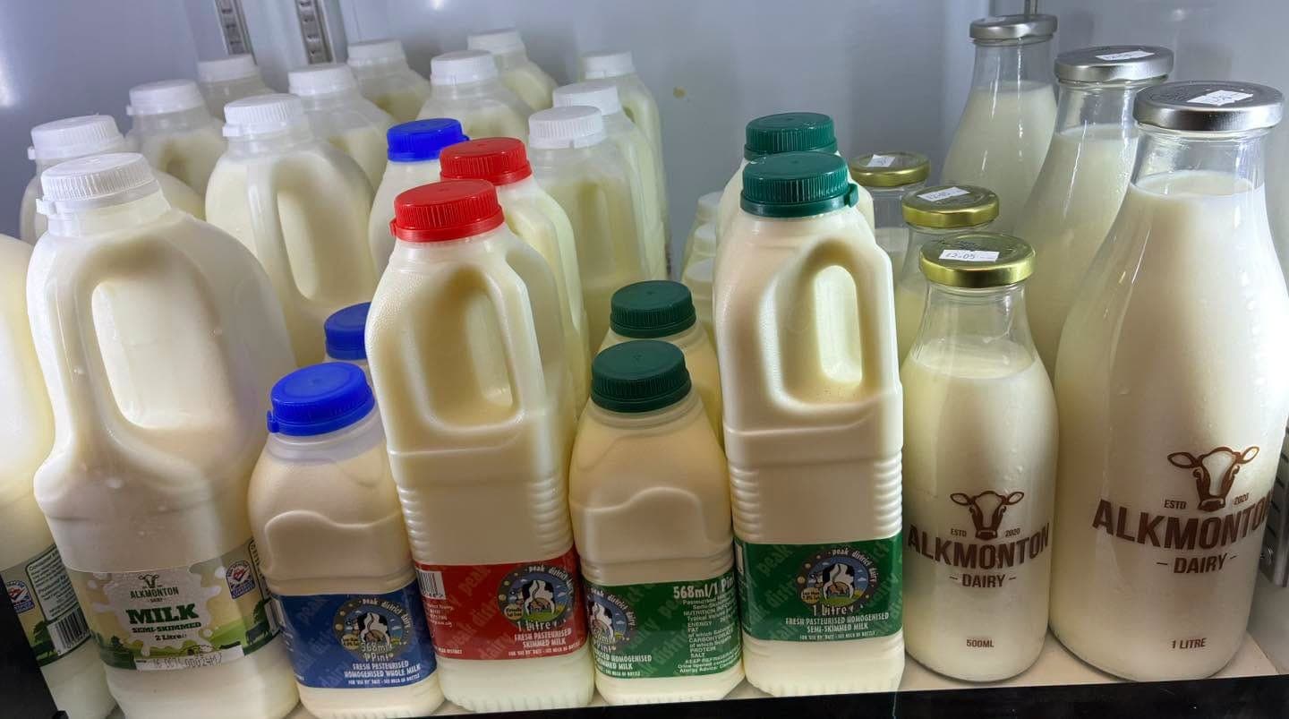 Bottles of fresh local milk in the fridge