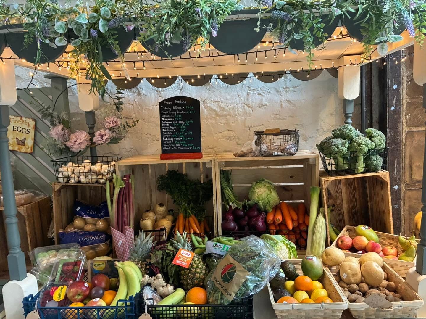 Crates of fresh fruit and vegetables in the farm shop