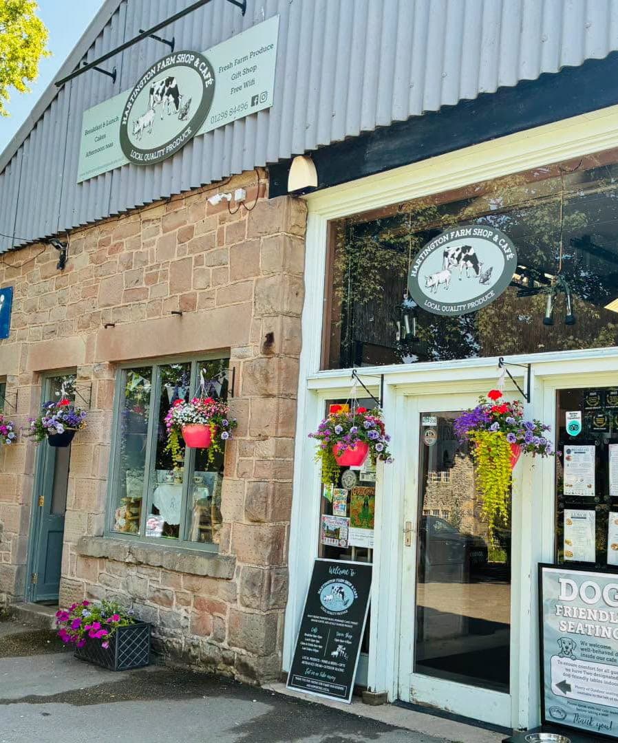 The entrance to Hartington Farm Shop & Café with hanging baskets